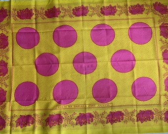 Single Khanga in pink and yellow polka dot and paisley African print kanga fabric