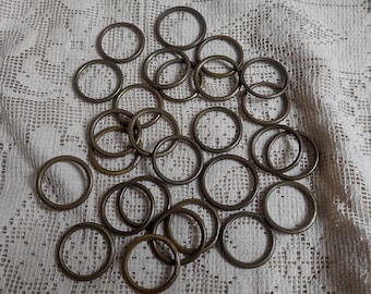 Vintage, brass curtain pole rings, set of 27 2.3 cm diameter