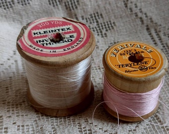 Two vintage,1960s wooden reels of synthetic thread, Kleintex and Perivale