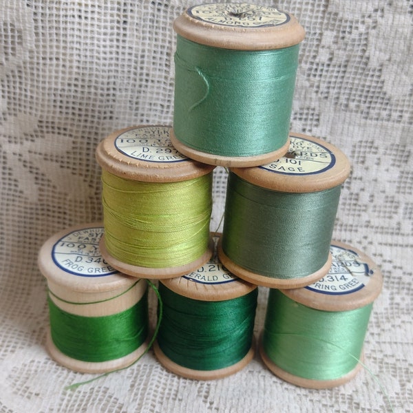 Six wooden reels of vintage Sylko cotton thread