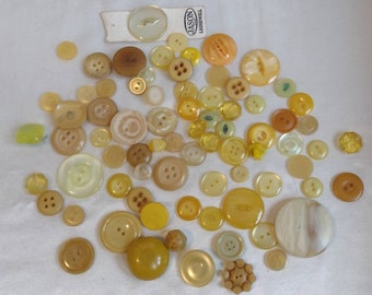 Assortment of 78 yellow, vintage buttons