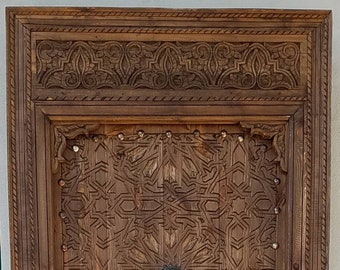 Unique Indoor wooden vintage moroccan door handmade with metal knocker and umberella nail heads moorish andalusian spanish geometric carving