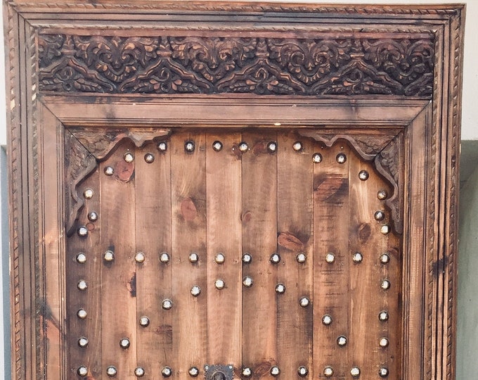 Vintage moroccan door handmade with metal knocker and umberella nail heads