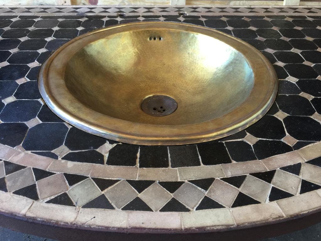 Half moon handmade mosaic tile sink with a brass vessel vintage harem