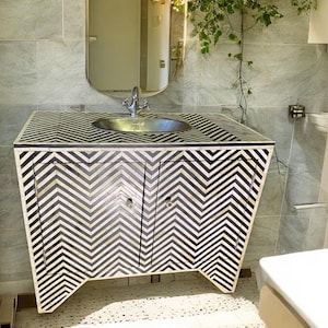 Handmade bone and resin Moroccan bathroom sink vanity cabinet with silver metal vessel sink