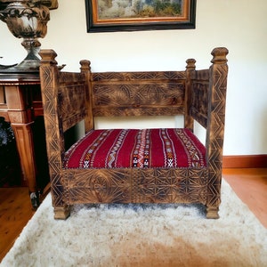 One of a kind African vintage wooden chair kilim rug touareg nomad chair, great moroccan furniture and home decor piece