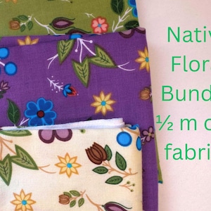 May include: A bundle of three floral fabrics in shades of green, purple, and cream. The fabrics feature a variety of colorful floral and leaf patterns. The text on the image reads "Native Floral Bundle 1/2 m of 3 fabrics."