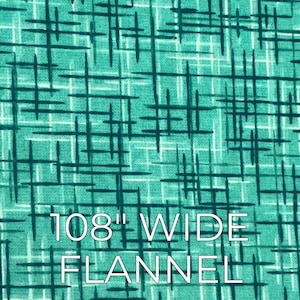 May include: Teal and white flannel fabric with a geometric pattern. The fabric is 108 inches wide.