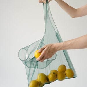 Ecofriendly transparent bag. Shopping bag. Net bag. Useful bag. Mash bag. Tulle bag. Reusable bags for buying fruits and vegetables. Shopper image 1