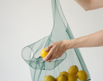 Ecofriendly transparent bag. Shopping bag. Net bag. Useful bag. Mash bag. Tulle bag. Reusable bags for buying fruits and vegetables. Shopper