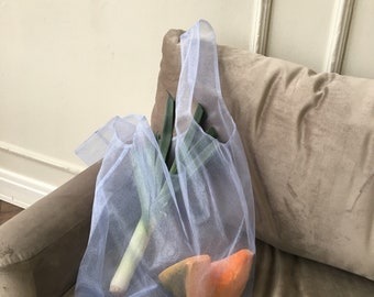 Light blue shopper bag. Tulle bag. Shopping bag. Net bag. Convenient package. Useful bag. Mash bag. Tote Bag. Organza bag.