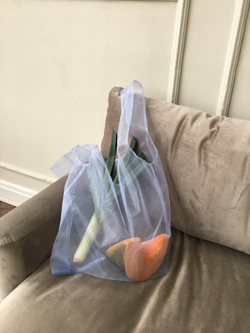 Light blue shopper bag. Tulle bag. Shopping bag. Net bag. Convenient package. Useful bag. Mash bag. Tote Bag. Organza bag. zdjęcie 1