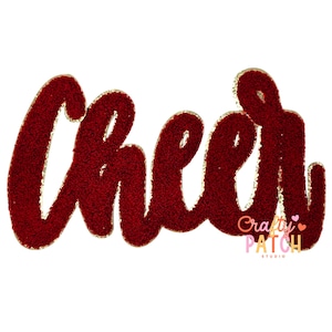 May include: A red, textured "Cheer" word art design with a gold glitter outline. The word is in a cursive font. The Crafty Patch Studio logo is in the lower right corner.