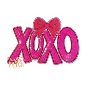 May include: A pink sequined XOXO patch with a red bow. The patch has a glittery outline and the letters are filled with sequins. The Crafty Patch Studio logo is in the lower left corner.