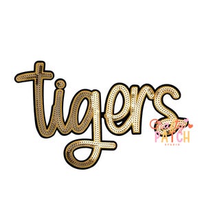 May include: Gold sequined "Tigers" word art with a black outline. The word is in a cursive font. The image also includes the "Crafty Patch Studio" logo in the bottom right corner.
