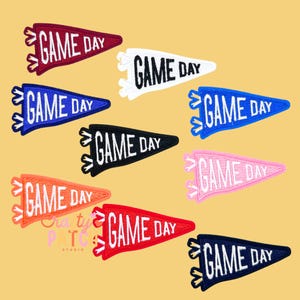 May include: A collection of pennant-shaped patches in various colors, including red, blue, black, and pink. Each patch features the text "GAME DAY" in white, perfect for sports fans. The patches are ideal for decorating apparel or accessories.