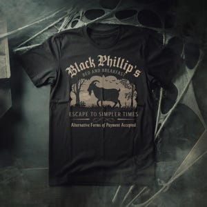 Black Phillip Bed & Breakfast - The VVitch Inspired Horror Movie Unisex Tee - Witch Witchy Black Phillip Goth Gothic Gifts Gift horror fan