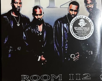 May include: Album cover for the R&B group 112's "Room 112" album. The cover features four men in black clothing. The album cover has a sticker that says "Celebrate Bad Boy" and "25th Anniversary of the Double Platinum Sophomore Album".