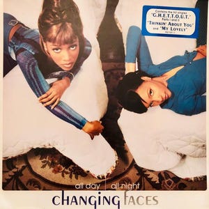 May include: Album cover for Changing Faces featuring two women in blue and patterned tops, lying on white pillows. The cover includes text that reads "G.H.E.T.T.O.U.T.", "THINKIN' ABOUT YOU", and "MY LOVELY". The bottom of the cover reads "CHANGING FACES".