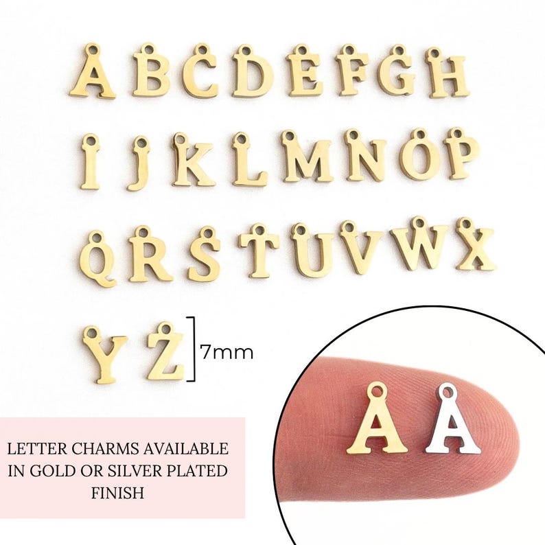 May include: Gold letter charms in the alphabet A through Z, each charm is 7mm in size. The charms are available in gold or silver plated finishes.