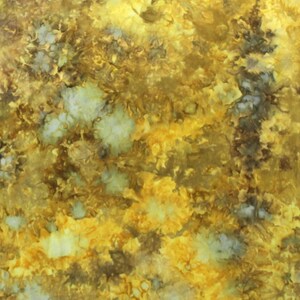 May include: A fabric featuring a tie-dye pattern in shades of golden yellow, mustard, brown, and off-white. The design displays organic, cloud-like clusters and mottled textures throughout the surface. The letter N is visible in the bottom right corner.