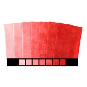 Hand dyed quilt fabric bundle, 7 step gradation moves from salmon pink through coral orange red, available as fat eighths, fq or half yards