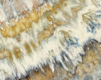 Cotton quilting fabric in shades of ochre, tan and gray