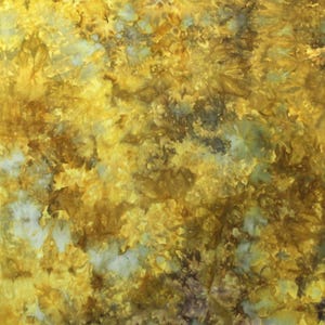 May include: A textile fabric featuring a tie-dye pattern with a blend of golden yellow, mustard, and deep brown hues, interspersed with subtle patches of pale grey and white, creating a textured, organic, and mottled appearance across the surface.