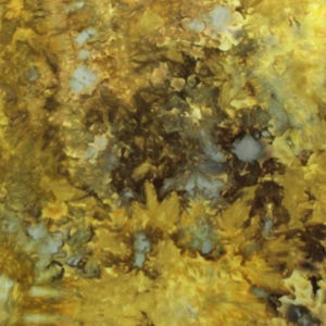 May include: A fabric featuring a tie-dye pattern in shades of mustard yellow, golden brown, and white. The design displays organic, swirling textures with concentrated areas of dark brown and lighter white highlights throughout the surface.
