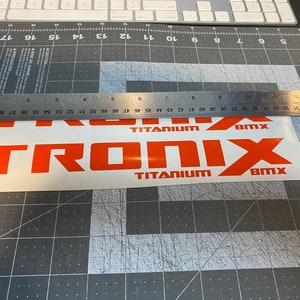 Conjunto de calcomanías de marco Tronix personalizado