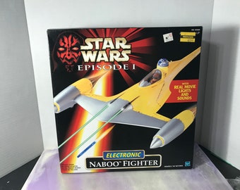 Star Wars Episode 1 Electronic Handheld Naboo Fighter Game w Anakin Figure NIB