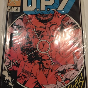 May include: A comic book cover featuring a group of people in a red and black target design. The title of the comic is "DP7" and the tagline is "New Universe Targets!"