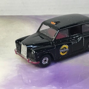 vintage Corgi London Taxi Black Suicide Back Doors - Rare vintage Die Cast Car -