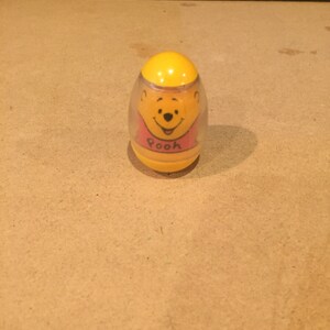 Winnie the pooh weeble wobble hotsell