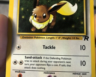 thumbnail image 2 of Pokemon Card Eevee 55/82 Team Rocket Unlimited - LP/NM Condition 2 of 6