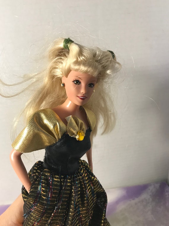 90s barbie black dress Margot Robbie Channels 1960s Barbie at L.A. Premiere