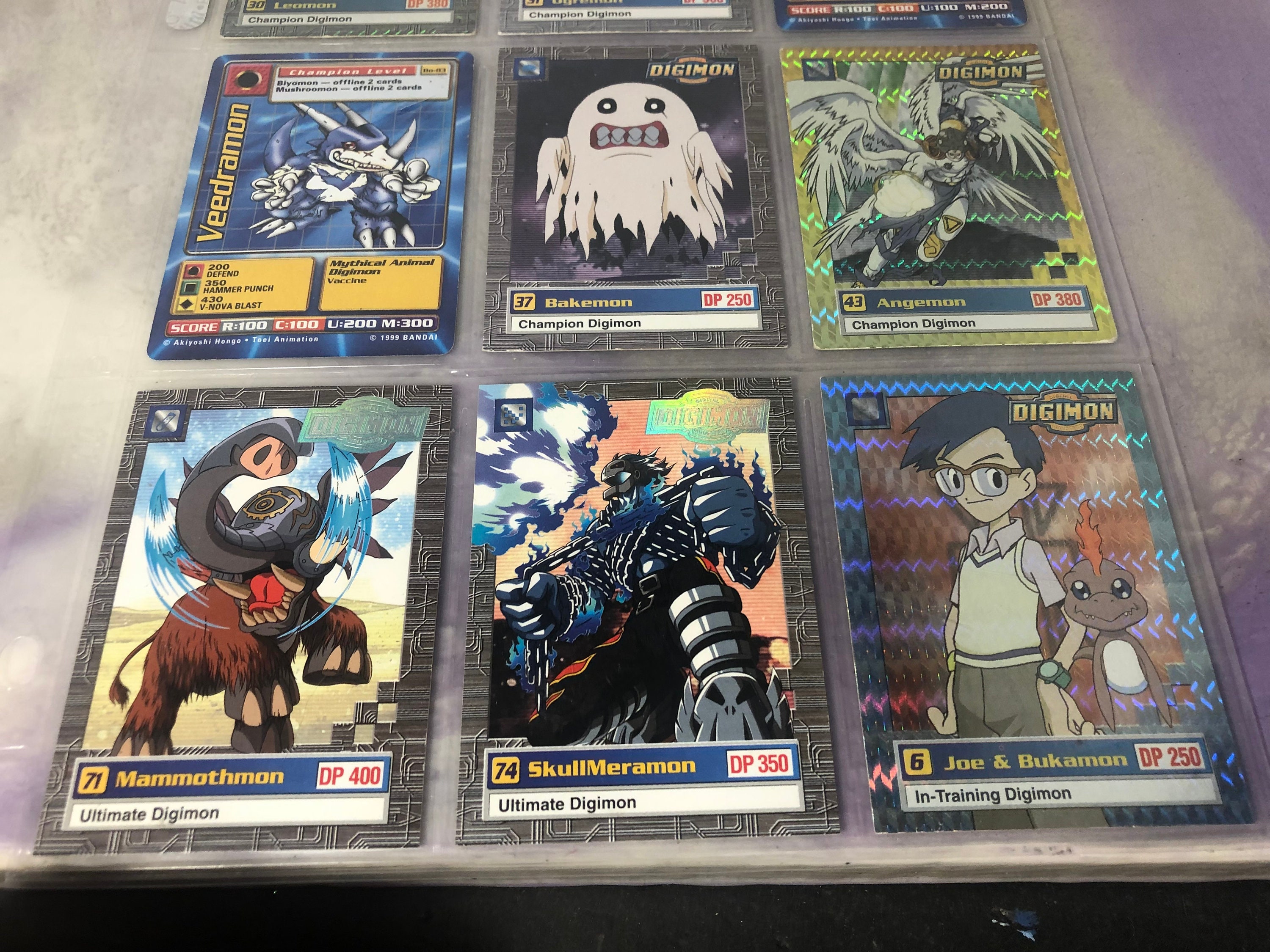 what stores sell digimon cards Ultra Pro Board Game Sleeves 65mm x 100mm (50) – Titan Bear Gaming main image 0