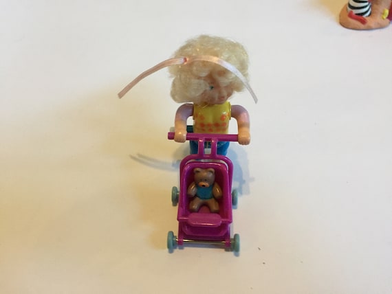 Vintage 1990 Meritus Industries Aufziehpuppe mit Kinderwagen - Vintage 90er  Jahre Aufziehspielzeug mit weiem Knopf - Etsy.de