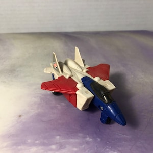 Figurka akcji TOMY COMMANDRONS SAMOLOT Super Alternators 1985 Transformers Vintage Mcdonalds Toy