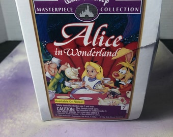 Vintage 1995 Alice in Wonderland Disney Masterpiece Collection VHS McDonalds Happy Meal Toy - VHS Themed Toy