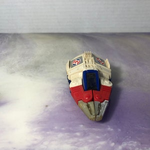 Figurka akcji TOMY COMMANDRONS VELOCITOR Super Alternators 1985 Transformers Vintage Mcdonalds Toy