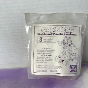 Vintage 1980&#39;s Garfield on Skateboard PVC Figure Brand New Sealed! Nostalgia MCDONALD&#39;S Vintage Happy Meal Toy Rare Nostalgia
