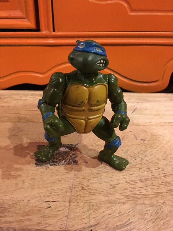 1980's teenage mutant ninja turtles action figures