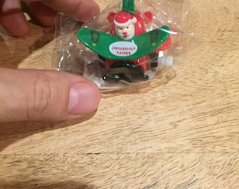 Vintage Brand New - Christmas Themed White Knob Wind Up Toy - Santa Claus!