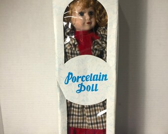 Vintage The Princess Collection, Porcelain Doll, Red Hair Doll with Red and Checkered Dress Porcelain Doll Brand New In Box
