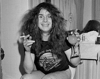 ozzy osbourne sitting on the toilet