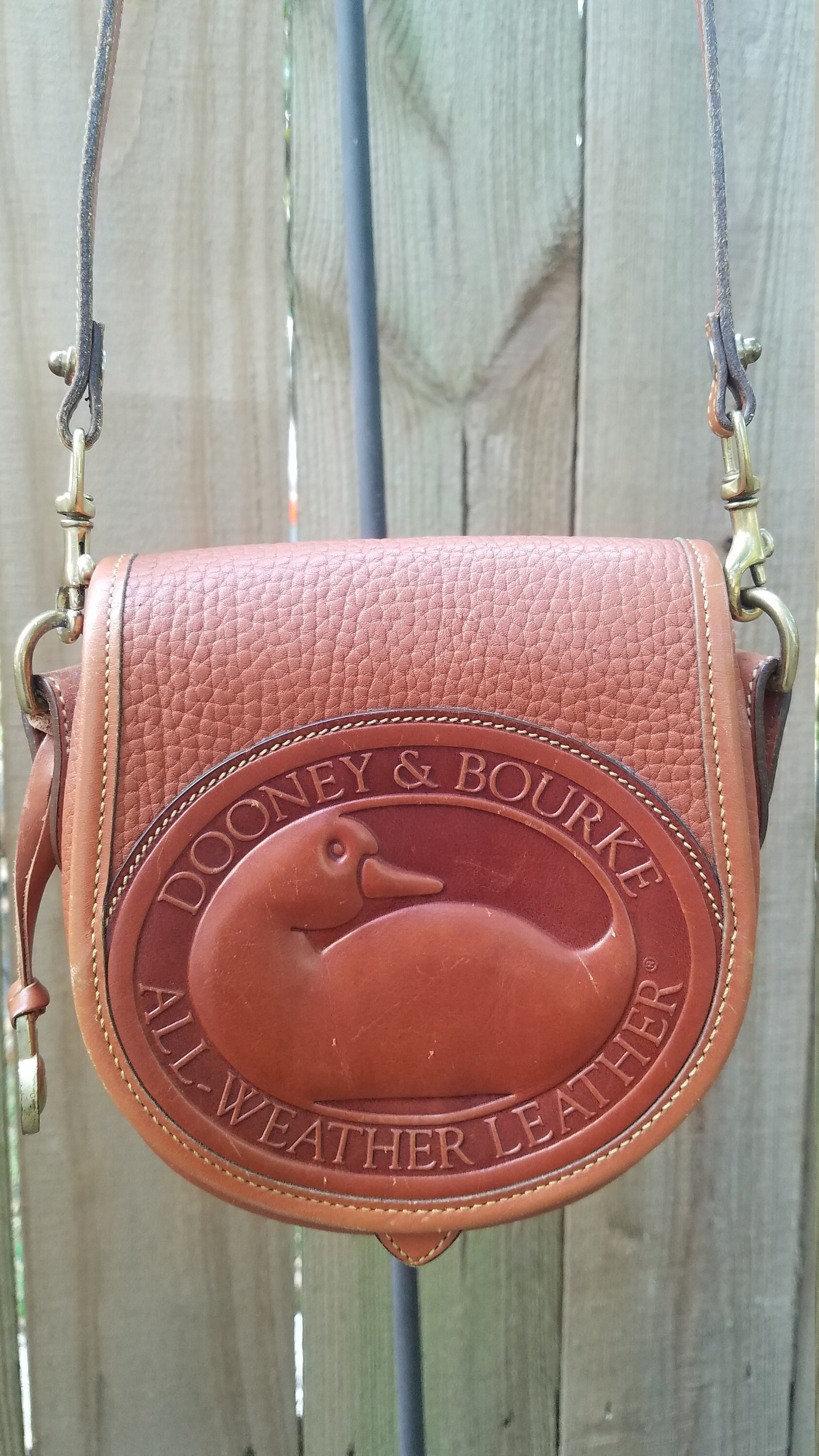 Vintage Dooney and Bourke All-Weather Leather Mini Saddle Bag with Belt Loop