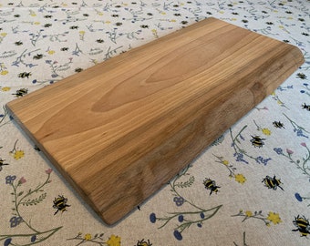 Live edge chopping board. Sweet chestnut natural cutting board.