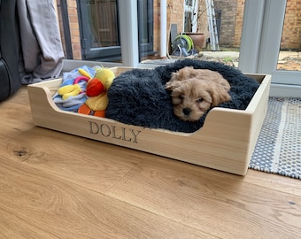 Wooden dog bed.