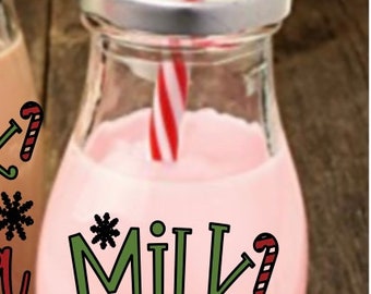 May include: A glass milk bottle with a red and white striped straw, a silver lid, and a pink liquid inside. The bottle has a white label with the text "Milk for Santa" in green, red, and black lettering with snowflakes.